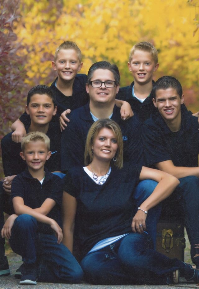 Studio portrait of the West family among fall colors